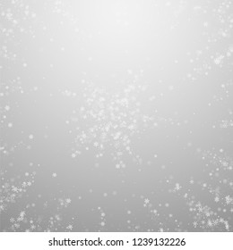 Beautiful snowfall Christmas background. Subtle flying snow flakes and stars on light grey background. Actual winter silver snowflake overlay template. Bewitching vector illustration.