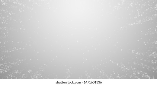 Beautiful snowfall Christmas background. Subtle flying snow flakes and stars on light grey background. Alive winter silver snowflake overlay template. Fetching vector illustration.