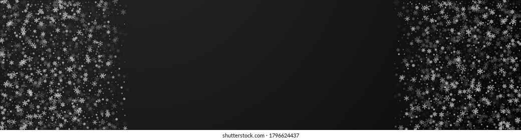 Beautiful snowfall Christmas background. Subtle flying snow flakes and stars on black background. Bizarre winter silver snowflake overlay template. Nice panoramic illustration.