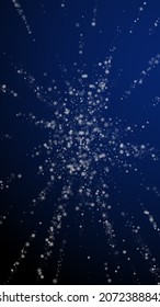 Beautiful snowfall Christmas background. Subtle flying snow flakes and stars on dark blue background. Alive winter silver snowflake overlay template. Emotional vertical illustration.