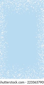 Beautiful snowfall christmas background. Subtle flying snow flakes and stars on light blue winter backdrop. Beautiful snowfall overlay template. Vertical vector illustration.