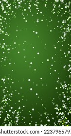 Beautiful snowfall christmas background. Subtle flying snow flakes and stars on christmas green background. Beautiful snowfall overlay template. Vertical vector illustration.