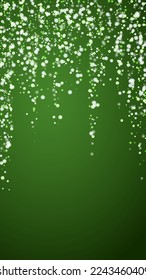 Beautiful snowfall christmas background. Subtle flying snow flakes and stars on christmas green background. Beautiful snowfall overlay template. Vertical vector illustration.