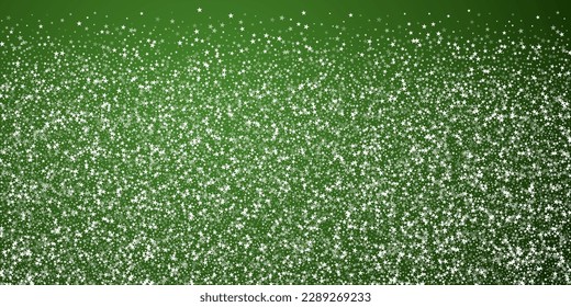 Beautiful snowfall christmas background. Subtle flying snow flakes and stars on christmas green background. Beautiful snowfall overlay template. Wide vector illustration.