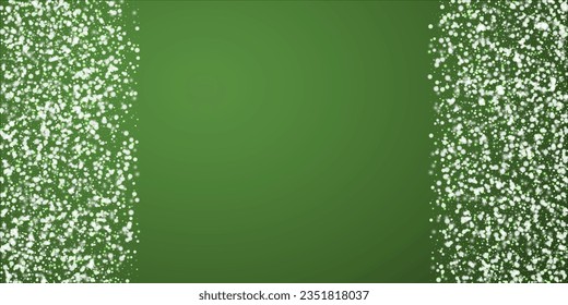 Beautiful snowfall christmas background. Subtle flying snow flakes and stars on christmas green background. Beautiful snowfall overlay template. Wide vector illustration.