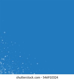 Beautiful snowfall. Messy bottom left corner with beautiful snowfall on blue background. Vector illustration.