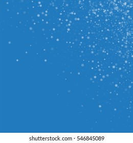 Beautiful snowfall. Scattered top right corner with beautiful snowfall on blue background. Vector illustration.