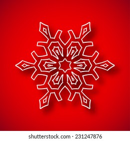 Beautiful snowflake with shadow on red background
