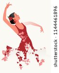 Beautiful Spanish flamenco dancer wearing flowery dress and flower in her hair