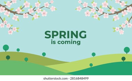 Beautiful spring greeting background with cherry blossoms hanging over rolling green hills under a clear blue sky.