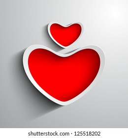 Beautiful St. Valentine's Day background, gift or greeting card with red paper hearts and on grey  background. EPS 10.