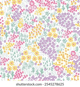 Beautiful summer floral pattern in small abstract flowers. Small colorful flowers. White background. Ditsy print in yellow, blue,purple