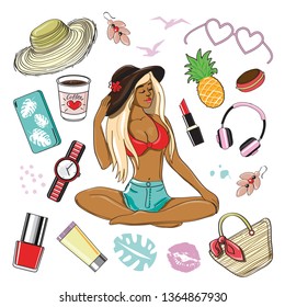 Beautiful summer girl sitting in a hat and woman beach items