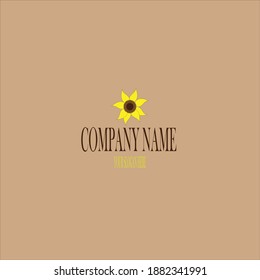 Beautiful sunflower logo on the light brown background.