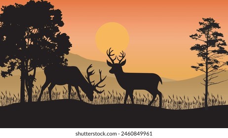 Beautiful sunset background with deer silhouettes