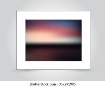 Beautiful sunset colors in an abstract background blur, in a beveled white mat frame. Vector EPS-10 file, transparency used. 