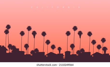 Beautiful sunset somewhere on the west coast of the USA. Palm trees and residential villas with pinkish sunset in the background