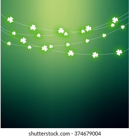 Beautiful template card for St. Patrick's Day with shining shamrock hanging on a string VECTOR