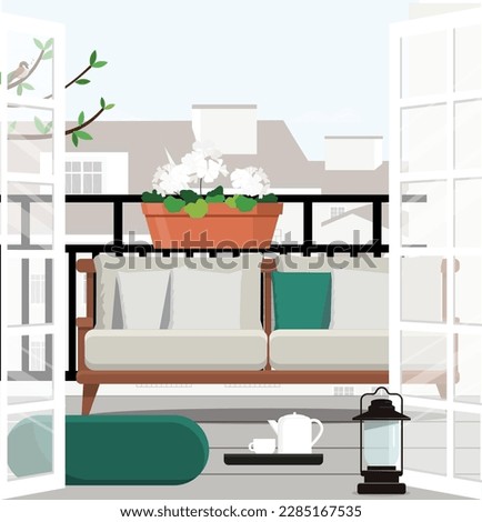 Beautiful terrace or balcony with small table, chair and flowers. Summer time Idyllic seating in the terrace with drink.