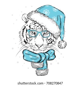A beautiful tiger in a New Year's cap and scarf. Vector illustration for a postcard or a poster. Santa Claus. New Year and Christmas.