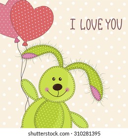 Beautiful toy bunny with hearts