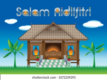 A beautiful traditional wooden Malay style village house. With village day's background. The silver words "Salam Aidilfitri" means happy Hari Raya.