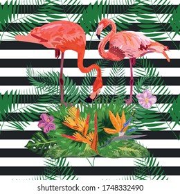beautiful tropic pink flamingo and hibiscus flower on a black and white geometric background. Seamless pattern