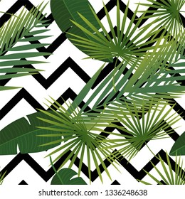 Beautiful tropical abstract color and green palm leaves seamless vector pattern on a background of geometric diagonal black and white lines