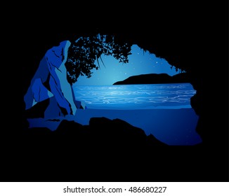 Beautiful tropical beach landscape night viewed by inside of a cave in Sununga, Ubatuba, Brazil. A real place named Cave Crying.