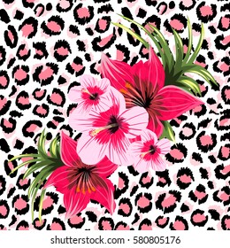 Beautiful tropical flowers bouquet on a leopard background