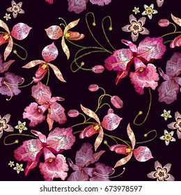 Beautiful tropical orchids paradise flower, classical embroidery template for clothes. Orchids embroidery seamless pattern vector 