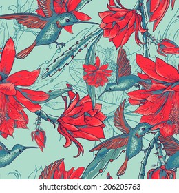 Beautiful tropical seamless background of red flowers and hummingbirds