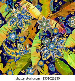 Beautiful tropical seamless pattern with banana leaves and paisley