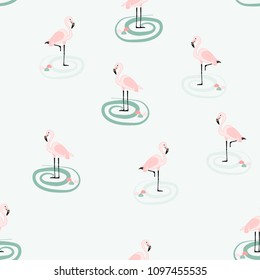Beautiful tropical seamless pattern with flamingos. Summer background with flamingos and tropical plants. Birds of the jungle.