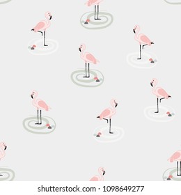 Beautiful tropical seamless pattern with flamingos. Summer background with flamingos. Birds of the jungle.