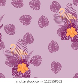Beautiful tropical seamless pattern with flamingos and flowers. Summer background with flamingos and tropical plants. Birds of the jungle.
