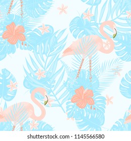 Beautiful tropical seamless pattern with flamingos and flowers. Summer background with flamingos and tropical plants. Birds of the jungle.