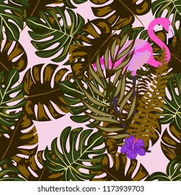 Beautiful tropical seamless pattern with flamingos and flowers. Summer background with flamingos and tropical plants. Birds of the jungle.