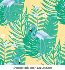 Beautiful tropical seamless pattern with flamingos and flowers. Summer background with flamingos and tropical plants. Birds of the jungle.