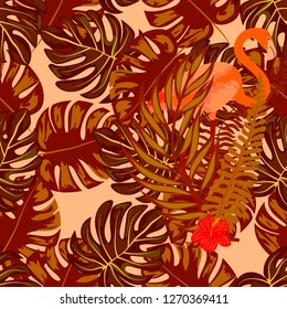 Beautiful tropical seamless pattern with flamingos and flowers. Summer background with flamingos and tropical plants. Birds of the jungle.