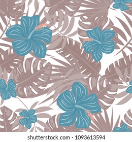 Beautiful tropical seamless pattern with flowers and leaves. Flowers of the jungle. Summer background with tropical leaves and flowers for fabric, wallpaper and cover