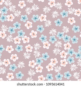Beautiful tropical seamless pattern with flowers and leaves. Flowers of the jungle. Summer background with tropical leaves and flowers for fabric, wallpaper and cover