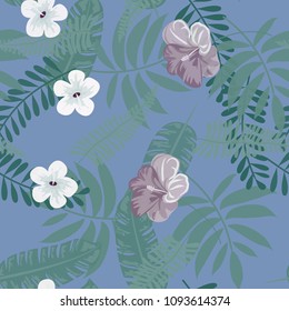 Beautiful tropical seamless pattern with flowers and leaves. Flowers of the jungle. Summer background with tropical leaves and flowers for fabric, wallpaper and cover