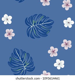 Beautiful tropical seamless pattern with flowers and leaves. Flowers of the jungle. Summer background with tropical leaves and flowers for fabric, wallpaper and cover