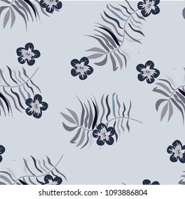 Beautiful tropical seamless pattern with flowers and leaves. Flowers of the jungle. Summer background with tropical leaves and flowers for fabric, wallpaper and cover