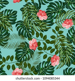 Beautiful tropical seamless pattern with flowers and leaves. Flowers of the jungle. Summer background with tropical leaves and flowers for fabric, wallpaper and cover.