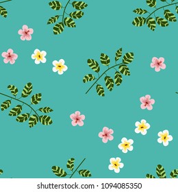 Beautiful tropical seamless pattern with flowers and leaves. Flowers of the jungle. Summer background with tropical leaves and flowers for fabric, wallpaper and cover.