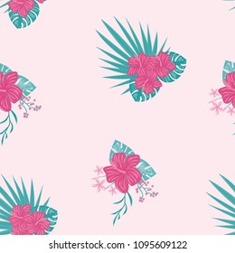 Beautiful tropical seamless pattern with flowers and leaves. Flowers of the jungle. Summer background with tropical leaves and flowers for fabric, wallpaper and cover.