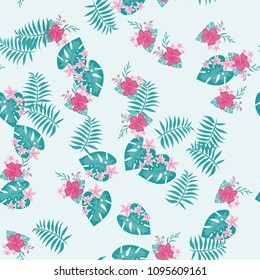 Beautiful tropical seamless pattern with flowers and leaves. Flowers of the jungle. Summer background with tropical leaves and flowers for fabric, wallpaper and cover.