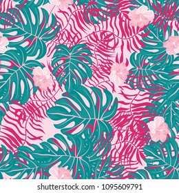 Beautiful tropical seamless pattern with flowers and leaves. Flowers of the jungle. Summer background with tropical leaves and flowers for fabric, wallpaper and cover.